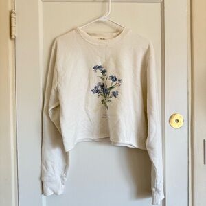 Brandy Melville White Sweatshirt with Blue Floral Design